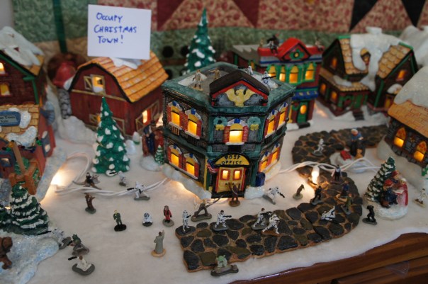 We considered all sorts of little flourishes. Pickets. Colored signs. Army men cracking down on the protesters. Polly Pocket hostages. But it was really hard to stand up these little guys on the batting. So we decided this was good enough.