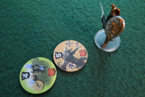 Okay, on the monster tiles: The top number is the armor. The number on the left is its strength. On the bottom is the fame (experience) that you gain when you defeat it. And on the right are special abilities—the werewolf, for instance, is swift, which means its attack is harder to block. Instead of an attack, the orc summoners summon a brown unit (the werewolf, in this instance) to fight alongside them. Okay, on the monster tiles: The top number is the armor. The number on the left is its strength. On the bottom is the fame (experience) that you gain when you defeat it. And on the right are special abilities—the werewolf, for instance, is swift, which means its attack is harder to block. Instead of an attack, the orc summoners summon a brown unit (the werewolf, in this instance) to fight alongside them.
