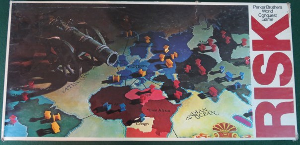 I wonder if 1980s politics informed the design of this box at all: Asia and South America are overrun by vicious Reds, Europe is barely hanging on, Africa is inconsequential... who can stand against the Crimson Tide? Thank heaven for the U.S. of A. and their huge cannons!