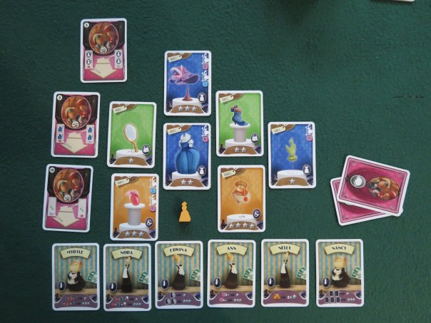 To the upper right, you can see the tear in our once-proud felt tabletop. To the upper right, you can see the tear in our once-proud felt tabletop.