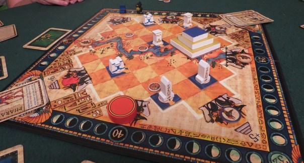 I'm not sure whether every game comes with these wooden pieces. I think most editions use cardboard standees. More's the pity, because with the wooden bits Heir to the Pharaoh looks *awesome*.