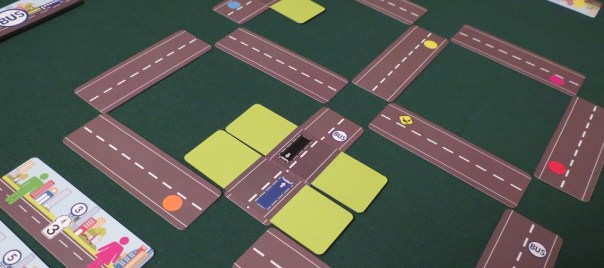 Little buses on the corner, little buses goin' round and round, little buses full of children, little buses makin' sounds.