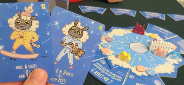 (Sheepy Time reveals genius in its little details. often they're so small that they escape notice. your goal is to hop the fence without getting caught by the nightmare. but you only have two cards, plus bonus tiles called dreams, to do so. and here's the rub. when you hop the fence, you will want to keep going. because the more you hop the fence, the closer your winning score threshold gets for the next round.)