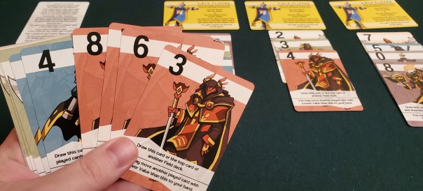 Every play, one of the five suits is marked as a bonus; when the game ends, every card of that suit in your hand is worth a point. Let's see if you can guess which suit came up as a bonus this time.