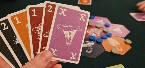 But! With a mushroom patch in the background this time.