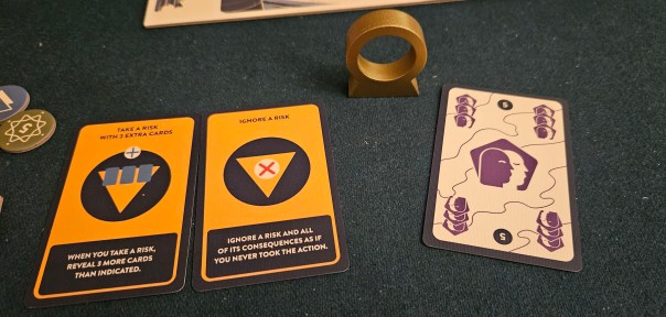 That little stargate indicates the current mission leader. Some nerd in my group used it as a "caster ring," but I don't know what that is.