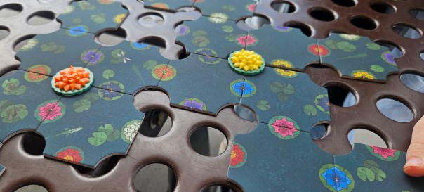 Actually, the tiles in the Bloom Edition aren't as nice as those in the original set. They don't have the gloss on their reverse side. Not that it really matters. Just interesting. Actually, the tiles in the Bloom Edition aren't as nice as those in the original set. They don't have the gloss on their reverse side. Not that it really matters. Just interesting.