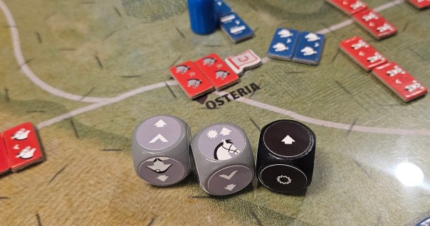 Ah, the BONE ZONE in the flesh. I don't really talk about the dice in the review, since it's already too long, but the gist is that they rock. Also, you can add a hazard die, the little black one, but it'll cost you in activation markers. And maybe bite you in the butt when your troops trip over themselves.