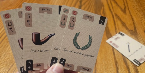 I've heard the complaint that the suits would function better if they were shaded distinctly from one another. But since you stack two of them together, it would tip information if the cards were even slightly splayed.