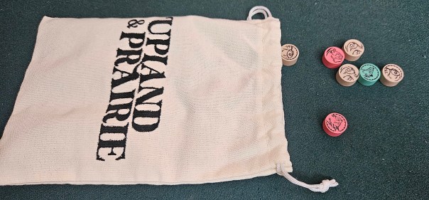 Finally, a publisher has given us a bag that can comfortably fit an adult human hand... and they did it for Upland & Prairie. Finally, a publisher has given us a bag that can comfortably fit an adult human hand... and they did it for Upland & Prairie.